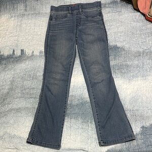 64. SPANX Flare Jeans in Classic Blue